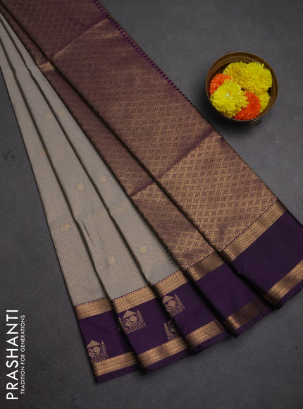 Semi soft silk saree grey and purple with allover small zari checks & buttas and zari woven broder