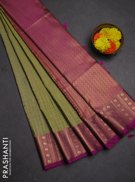 Semi soft silk saree pastel green and magenta pink with allover zari checked pattern and zari woven border