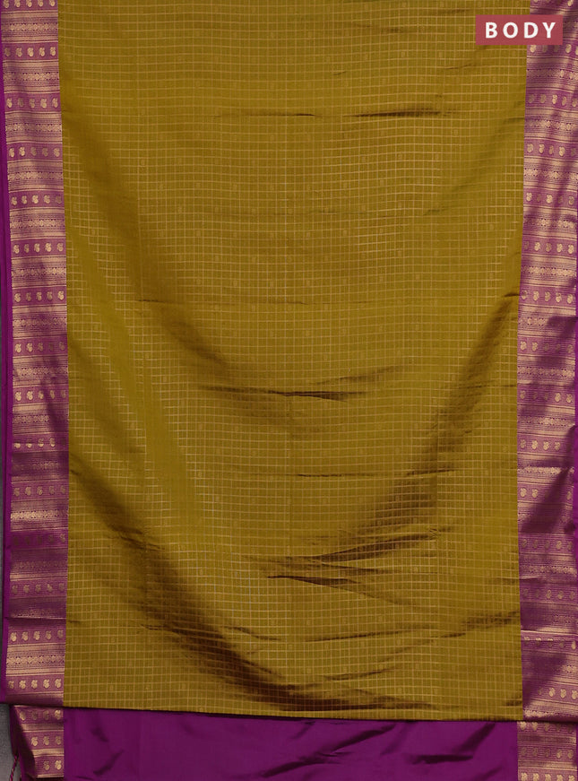 Semi soft silk saree mustard green and magenta pink with allover zari checks & buttas and zari woven border