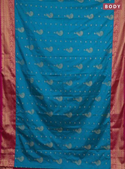 Semi soft silk saree teal blue and pink with allover zari woven buttas and zari woven border