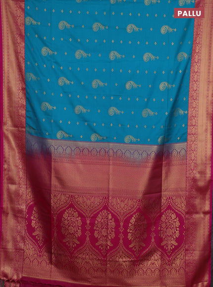 Semi soft silk saree teal blue and pink with allover zari woven buttas and zari woven border