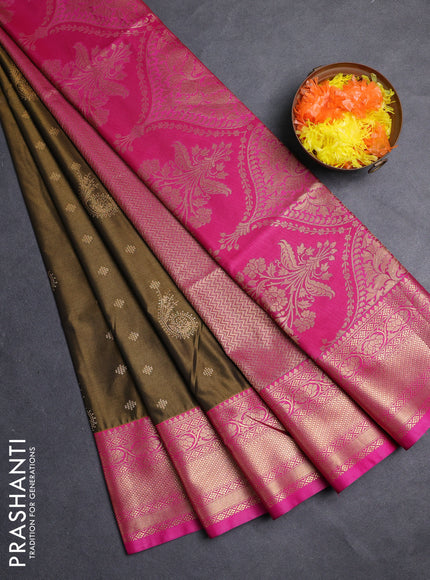 Semi soft silk saree dark mehendi green and pink with allover zari woven buttas and zari woven border