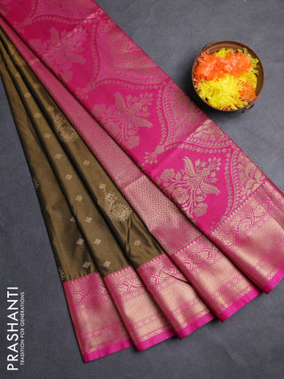 Semi soft silk saree dark mehendi green and pink with allover zari woven buttas and zari woven border