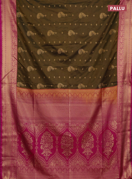 Semi soft silk saree dark mehendi green and pink with allover zari woven buttas and zari woven border