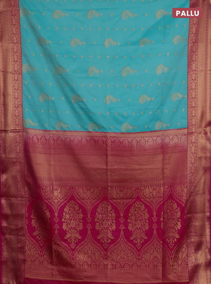Semi soft silk saree teal blue and pink with allover zari woven buttas and zari woven border