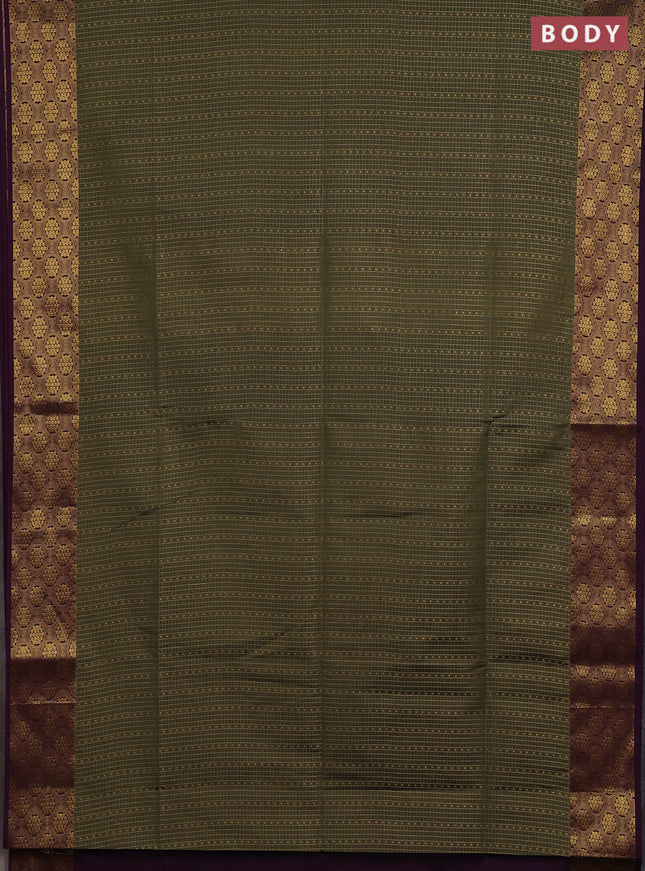 Semi soft silk saree olive green and purple with allover zari checks & buttas and zari woven border