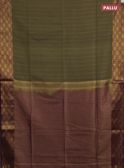 Semi soft silk saree olive green and purple with allover zari checks & buttas and zari woven border