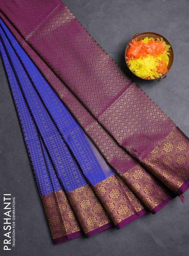 Semi soft silk saree blue and purple with allover zari checks & buttas and zari woven border