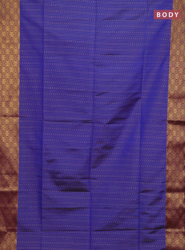 Semi soft silk saree blue and purple with allover zari checks & buttas and zari woven border