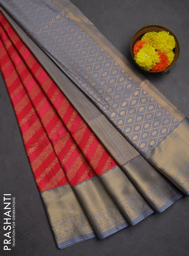 Semi soft silk saree tomato pink and grey with allover zari weaves and zari woven border