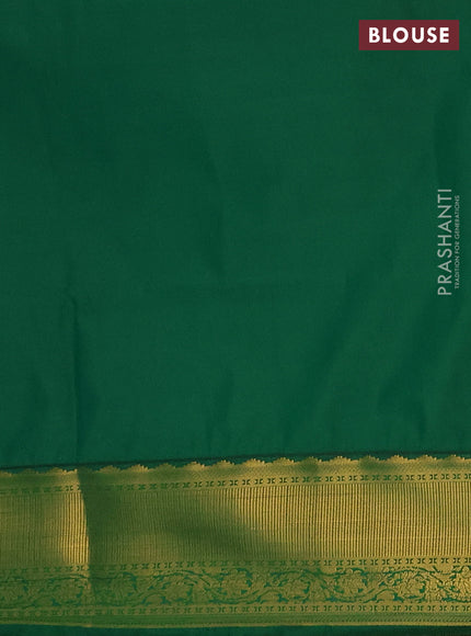 Semi soft silk saree purple and green with allover zari weaves and zari woven border
