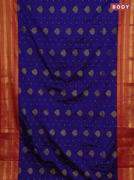 Semi soft silk saree blue and dual shade of pinkish orange with allover zari woven buttas and zari woven border