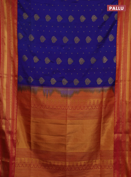 Semi soft silk saree blue and dual shade of pinkish orange with allover zari woven buttas and zari woven border