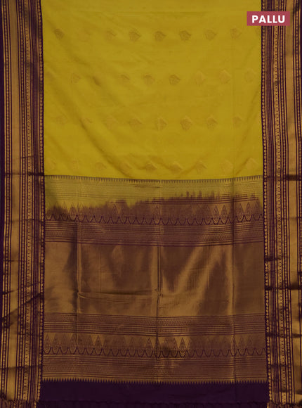 Semi soft silk saree pale yellow and purple with allover zari woven buttas and zari woven border