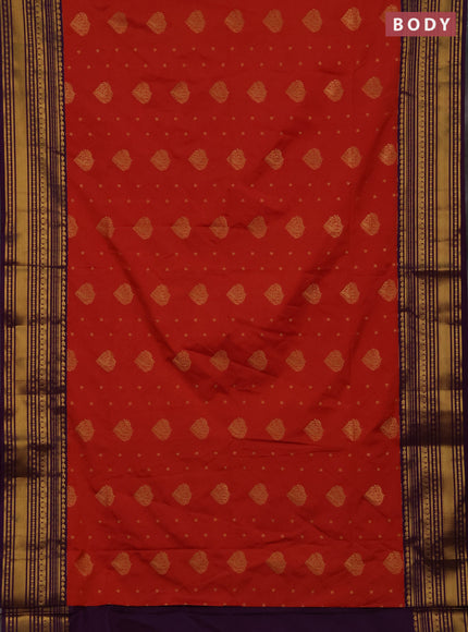 Semi soft silk saree rustic orange and purple with allover zari woven buttas and zari woven border