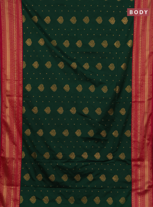 Semi soft silk saree green and pink with allover zari woven buttas and zari woven border