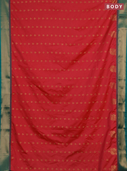 Semi soft silk saree tomato pink and teal green with allover zari woven buttas and rich zari woven border