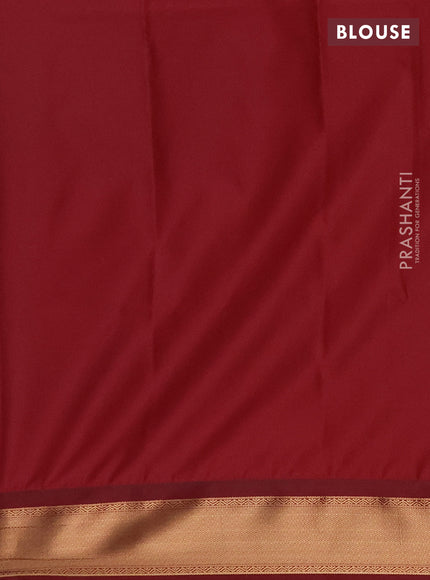 Semi soft silk saree teal blue and maroon with allover zari woven buttas and rich zari woven border