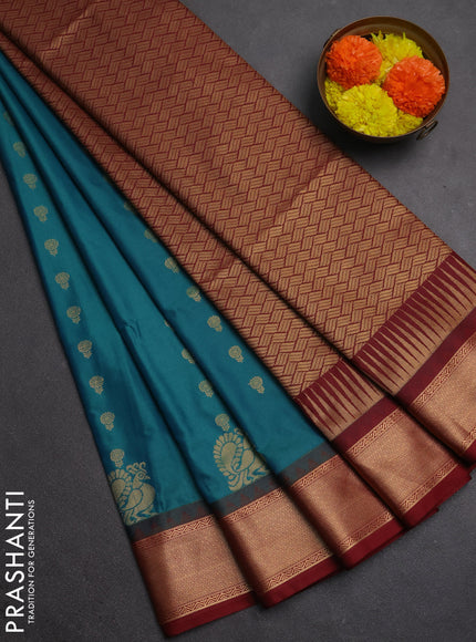 Semi soft silk saree peacock green and maroon with allover zari woven buttas and rich zari woven border