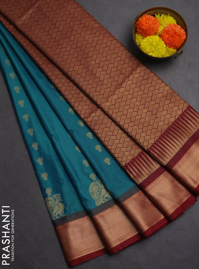 Semi soft silk saree peacock green and maroon with allover zari woven buttas and rich zari woven border