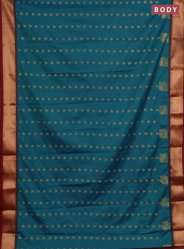 Semi soft silk saree peacock green and maroon with allover zari woven buttas and rich zari woven border