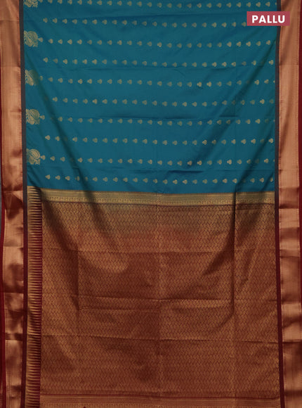 Semi soft silk saree peacock green and maroon with allover zari woven buttas and rich zari woven border