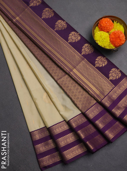 Semi soft silk saree beige and purple with allover zari woven buttas and zari woven border