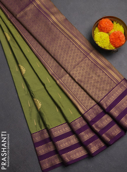 Semi soft silk saree green and purple with allover zari woven buttas and zari woven border