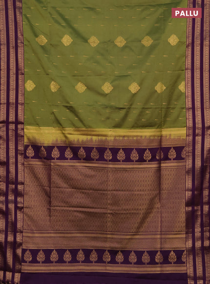 Semi soft silk saree green and purple with allover zari woven buttas and zari woven border
