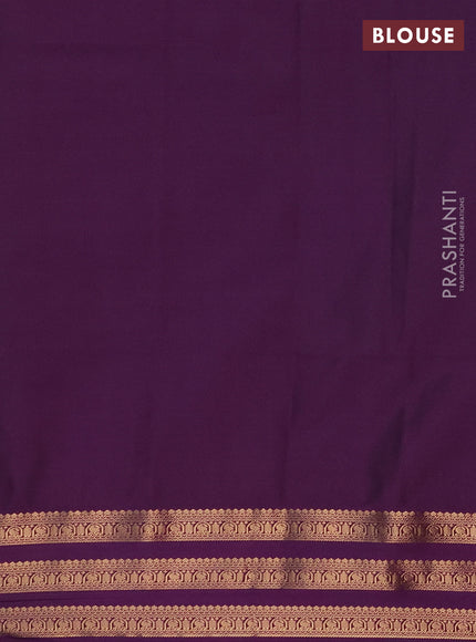 Semi soft silk saree green and purple with allover zari woven buttas and zari woven border