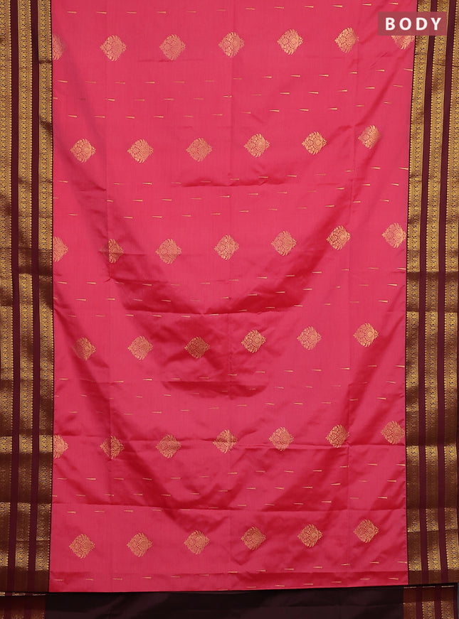 Semi soft silk saree tomato pink shade and maroon with allover zari woven buttas and zari woven border