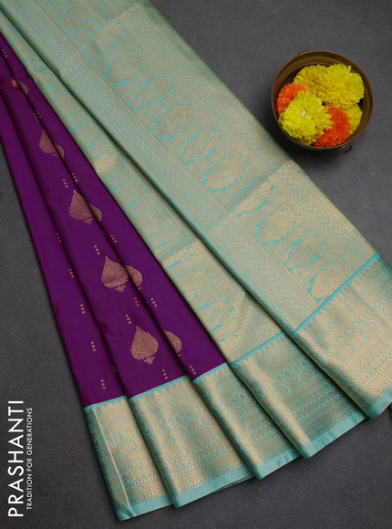 Semi soft silk saree purple and teal shade with allover zari woven buttas and zari woven border
