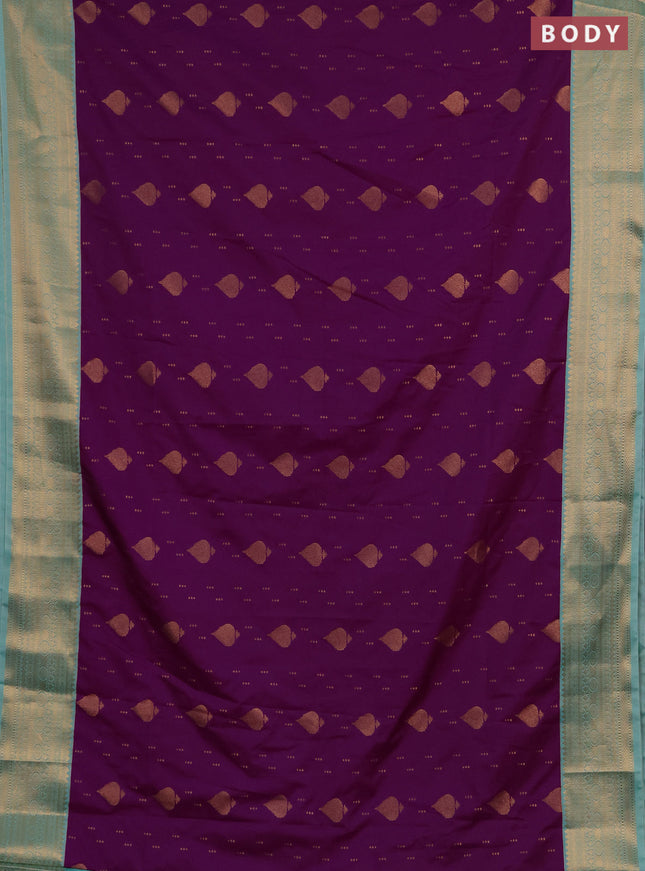 Semi soft silk saree purple and teal shade with allover zari woven buttas and zari woven border