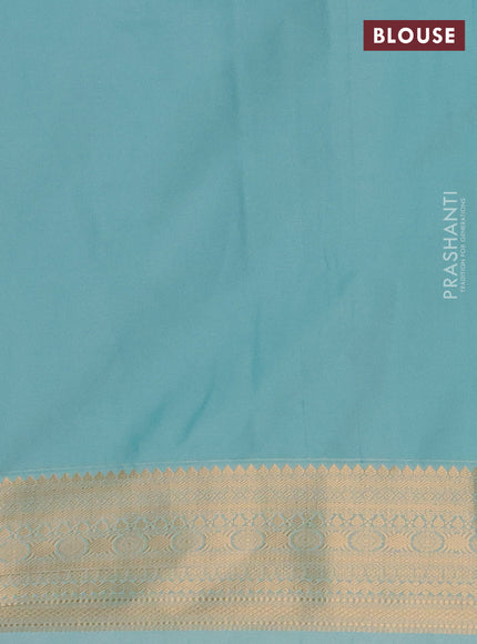 Semi soft silk saree purple and teal shade with allover zari woven buttas and zari woven border