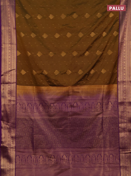 Semi soft silk saree dark mustard and purple with allover zari woven buttas and zari woven border