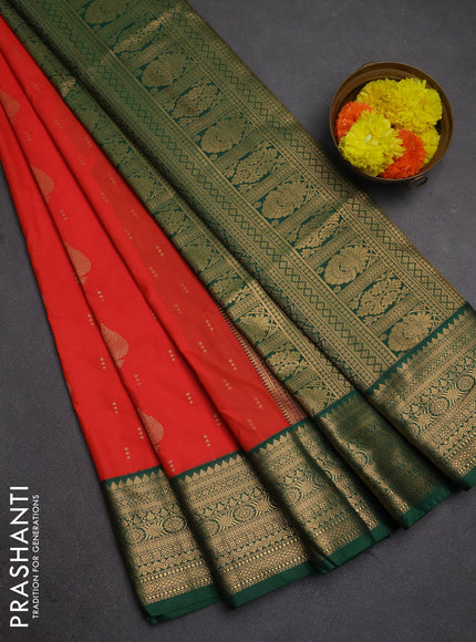 Semi soft silk saree orange and green with allover zari woven buttas and zari woven border