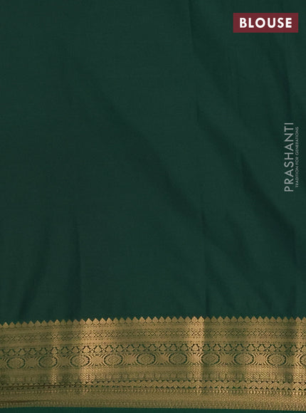 Semi soft silk saree orange and green with allover zari woven buttas and zari woven border