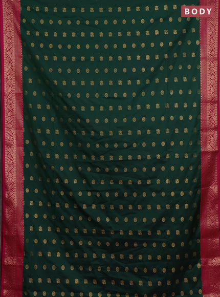 Semi soft silk saree green and pink with allover zari woven buttas and zari woven border