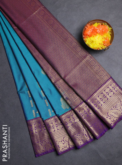 Semi soft silk saree teal green and purple with allover zari weaves & buttas and zari woven border