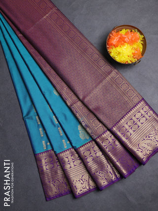 Semi soft silk saree teal green and purple with allover zari weaves & buttas and zari woven border