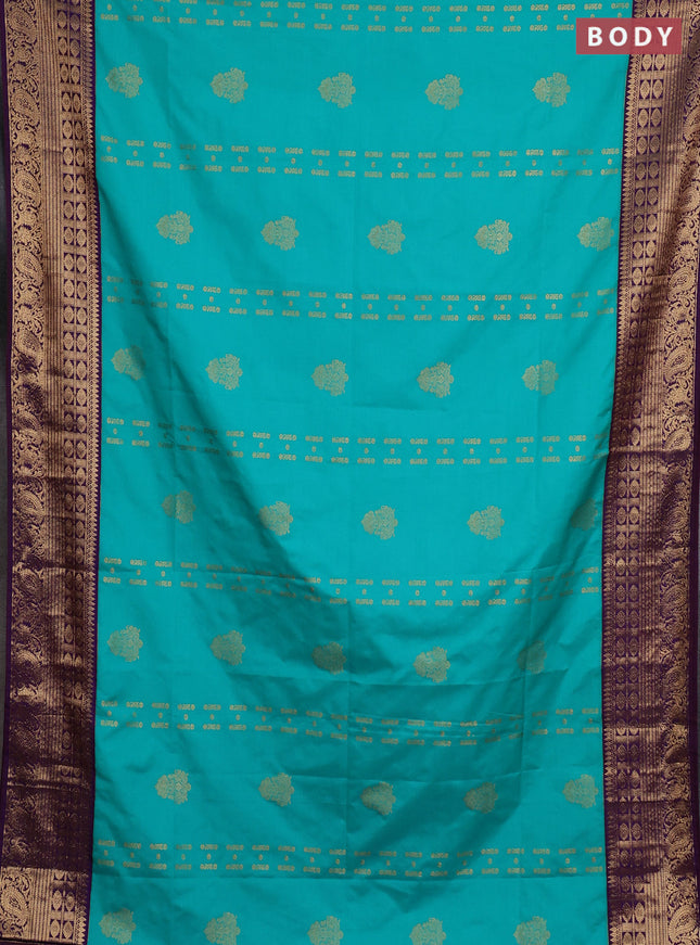 Semi soft silk saree teal green and purple with allover zari weaves & buttas and zari woven border