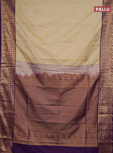 Semi soft silk saree beige and purple with allover zari weaves & buttas and zari woven border