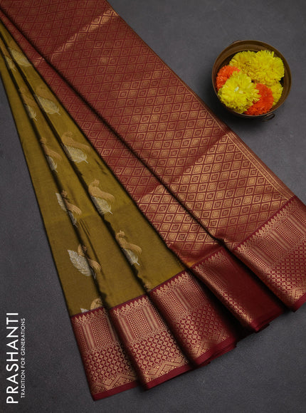 Semi soft silk saree mustard green and maroon with allover zari woven buttas and zari woven border