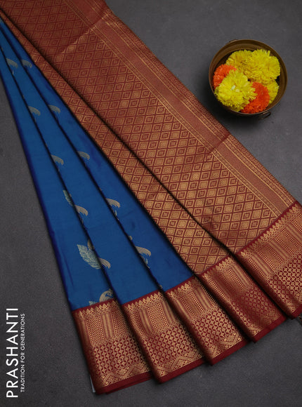 Semi soft silk saree peacock green and maroon with allover zari woven buttas and zari woven border