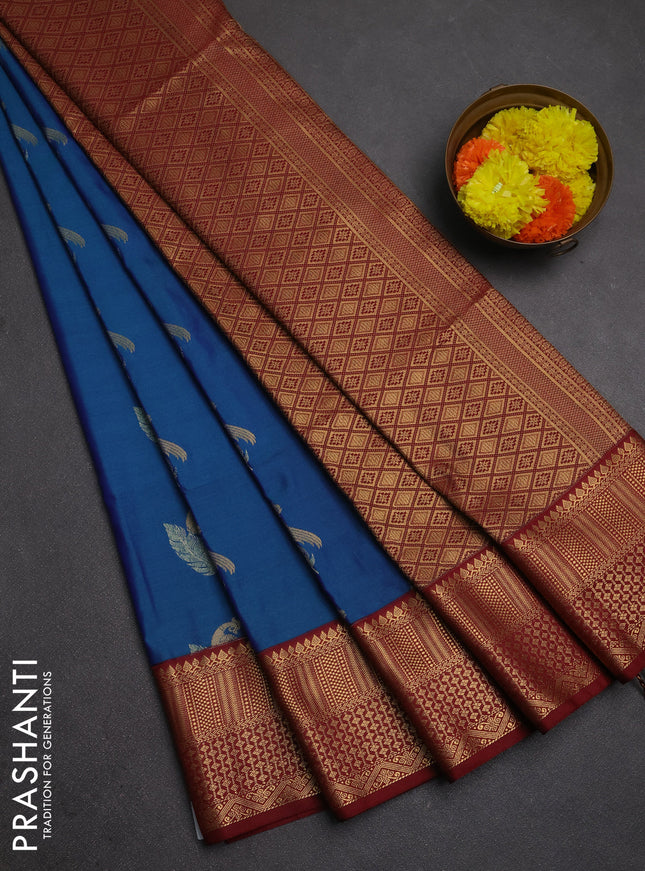 Semi soft silk saree peacock green and maroon with allover zari woven buttas and zari woven border