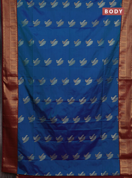 Semi soft silk saree peacock green and maroon with allover zari woven buttas and zari woven border