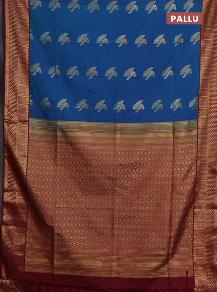 Semi soft silk saree peacock green and maroon with allover zari woven buttas and zari woven border