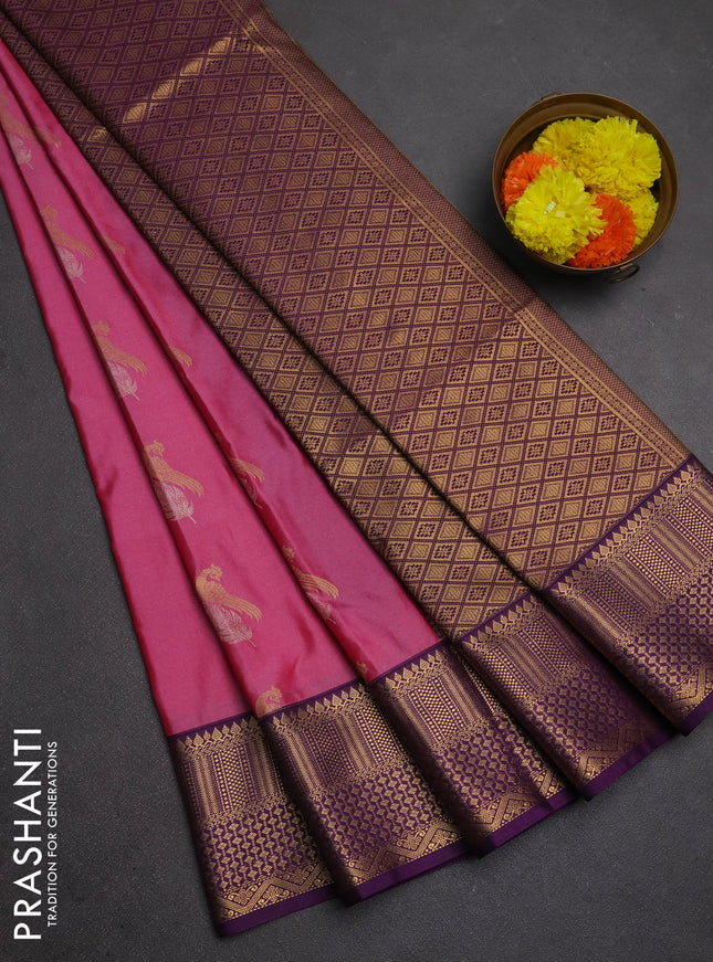 Semi soft silk saree pink and purple with allover zari woven buttas and zari woven border