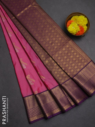 Semi soft silk saree pink and purple with allover zari woven buttas and zari woven border