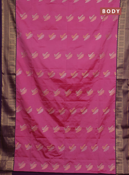 Semi soft silk saree pink and purple with allover zari woven buttas and zari woven border